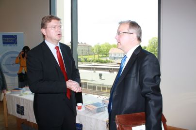 Ministr Fülle a eurokomisař Rehn