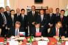 Ministr Jan Kohout při podpisu smlouvy mezi firmami Nafigate a Guodian