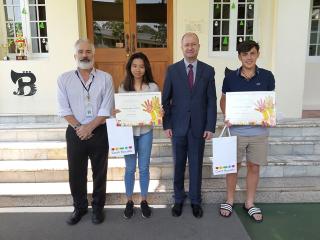 International School Yangon - V. Michalík and awarded students Erica Lynn and Randolph Cepheus with their teacher