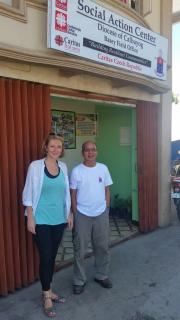 Fr. Cesar Aculan of Diocesan Social Action Center and Ms. Helena Kotková, Charita Czech Republic country representative in front of their office in Basey 